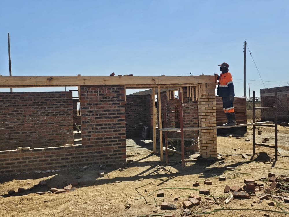 Brickwork and door frames going up