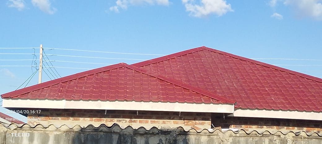 Close-up of the red tile-profile sheeting